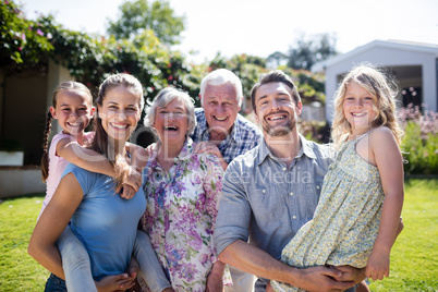 Portrait of a multi-generation family in the garden