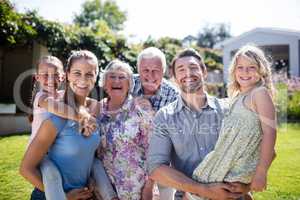 Portrait of a multi-generation family in the garden