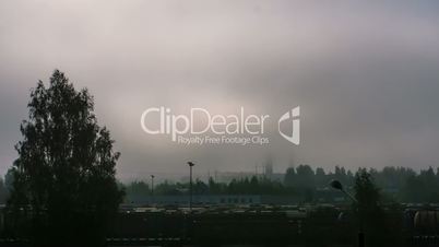 Foggy sunrise at a train station time lapse 4k