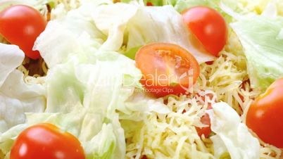 Beautiful colourful caesar salad with dressing croutons and parmesan cheese, healthy meal
