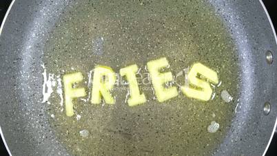 Stir-frying mixed alphabet letters, word Fries