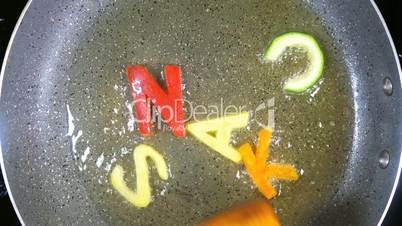 Stir-frying mixed alphabet letters, word Snack