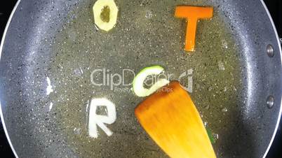 Stir-frying mixed alphabet letters, word Roast