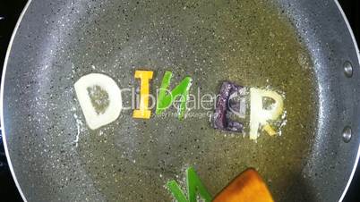 Stir-frying mixed alphabet letters, word Dinner