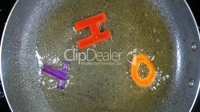 Stir-frying mixed alphabet letters, word Hot