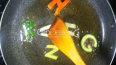 Stir-frying mixed alphabet letters, word Hunger