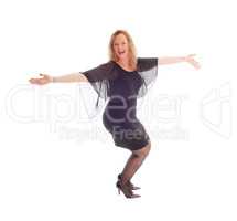 Happy dancing woman in black dress.