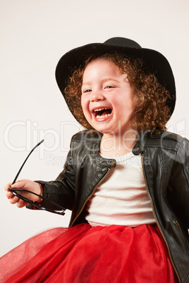 Little Girl Fashion Model With Black Hat