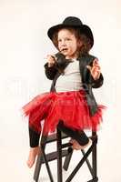 Little Girl Fashion Model With Black Hat