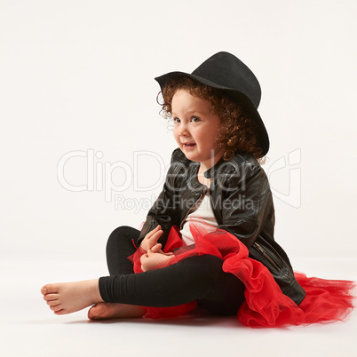 Little Girl Fashion Model With Black Hat