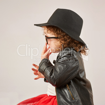 Little Girl Fashion Model With Black Hat