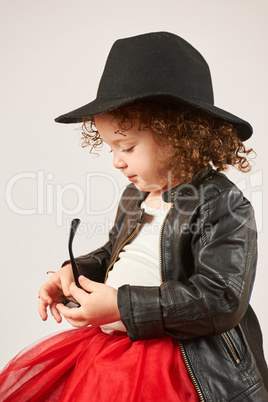 Little Girl Fashion Model With Black Hat