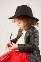 Little Girl Fashion Model With Black Hat