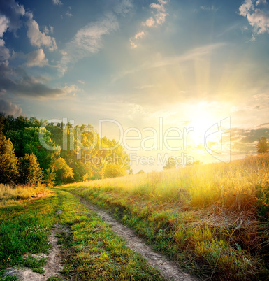 Sunbeams and country road