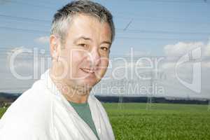 Portrait of farmer in front of his box