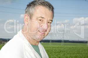 Portrait of farmer in front of his box