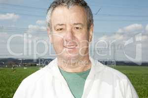 Portrait of farmer in front of his box