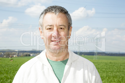 Portrait of farmer in front of his box