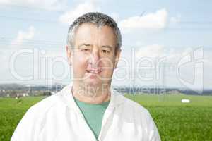 Portrait of farmer in front of his box