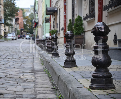 Old cobbled street with tram tracks in the downtown of Lviv