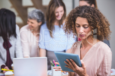 Businesswoman using digital tablet