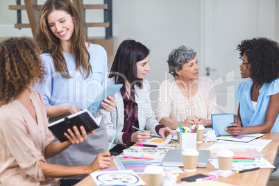 Group of interior designers interacting with each other