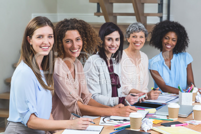 Portrait of interior designers smiling