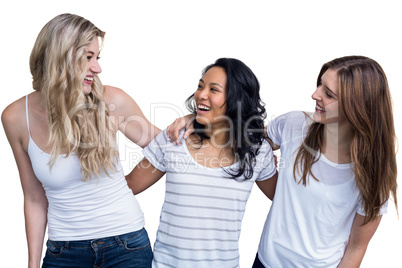 Multiethnic women standing together with arm around