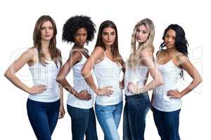 Portrait of multiethnic women standing with hand on hip