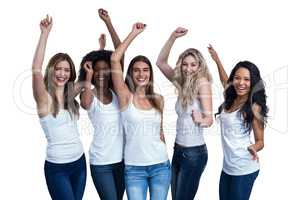 Multiethnic women dancing on white background