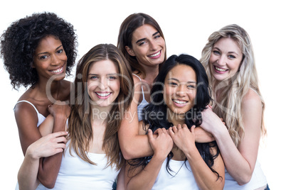 Portrait of multiethnic women embracing each other