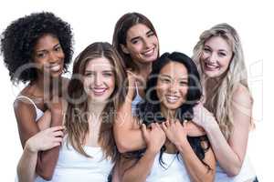Portrait of multiethnic women embracing each other