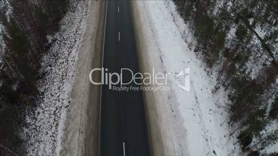 Aerial shot of empty winter road