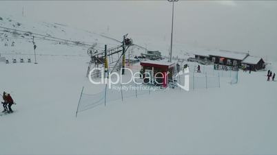 Flying over ski lift on winter resort