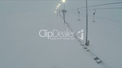 Aerial shot of ski lift and lampposts