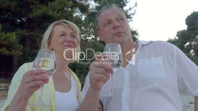 Man and Woman Having Drink and Talk Outdoor