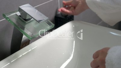 Washing Hands under the Modern Tap