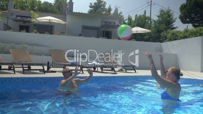 Funny and active day in the pool by vacation home