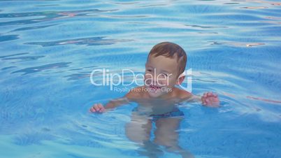 Smiling Boy in Swimming Pool