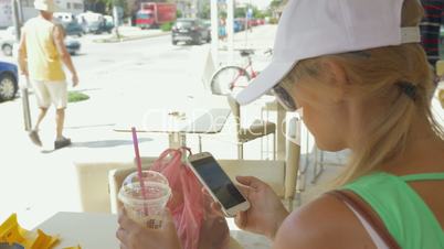 Woman communicating in mobile messenger