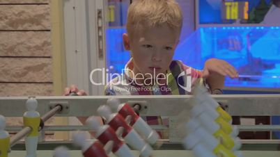 Little child and table football