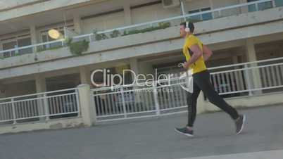 Man jogging with music in the morning