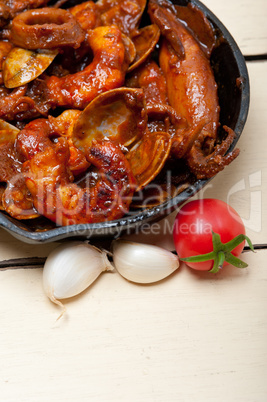 fresh seafoos stew on an iron skillet