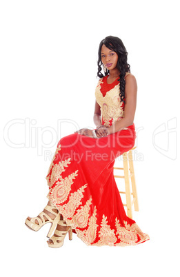 African American woman in a red dress.