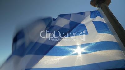 Greek flag waving in the wind on sky background