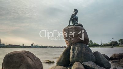 Timelapse of clouds and water by Little Mermaid statue