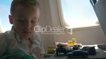 Playful child is ready for enjoyable flight