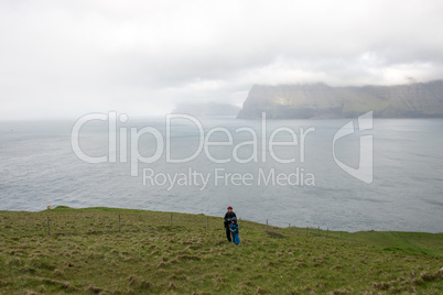 People hiking on the Faroe Islands