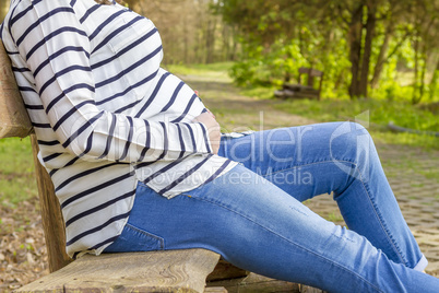 beautiful pregnant woman outdoor in the park