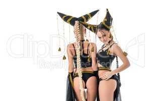 Sexy go-go dancers, isolated on white backdrop